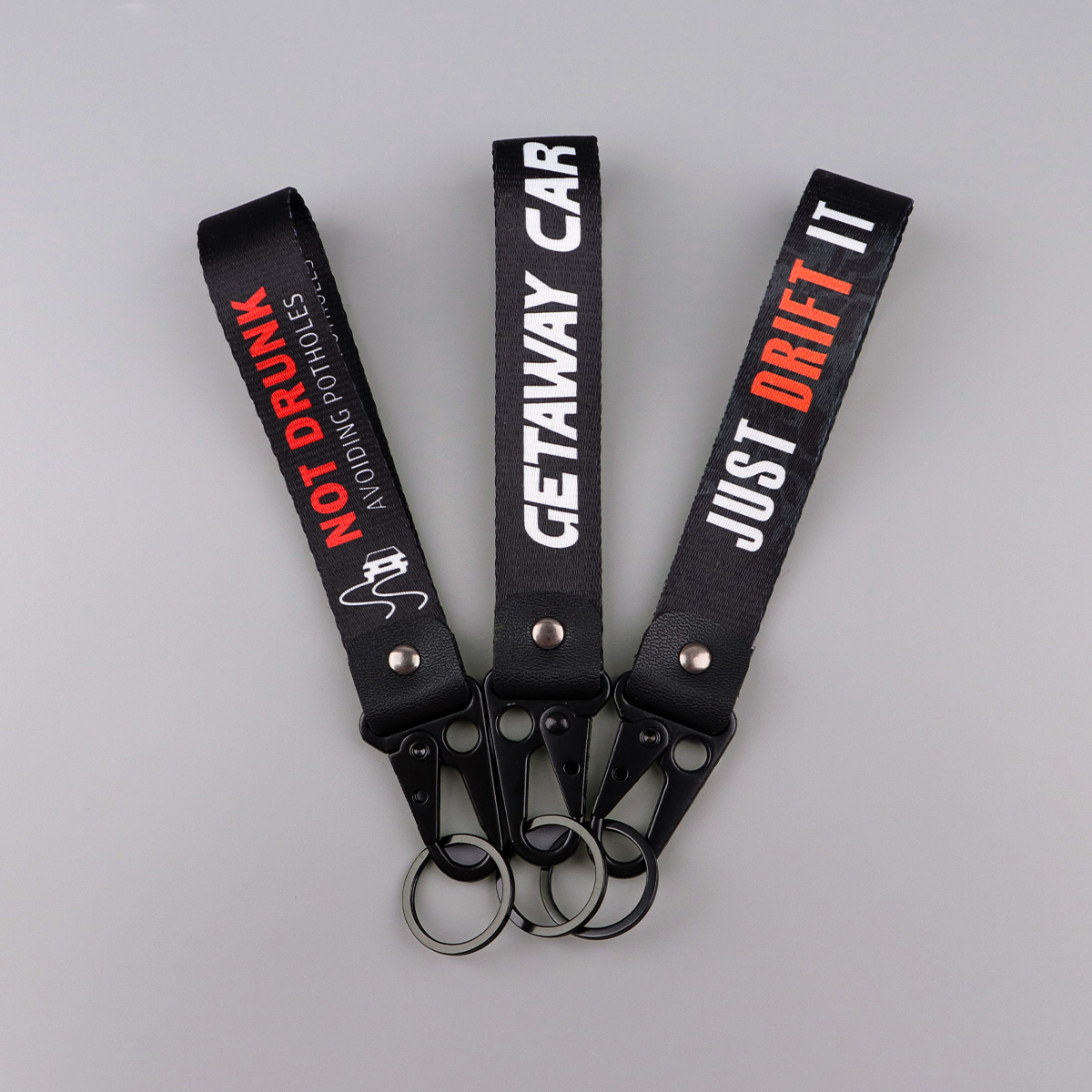 Gantungan Kunci Racing Quote J - Tech Wear Accessories ulasan dan harga