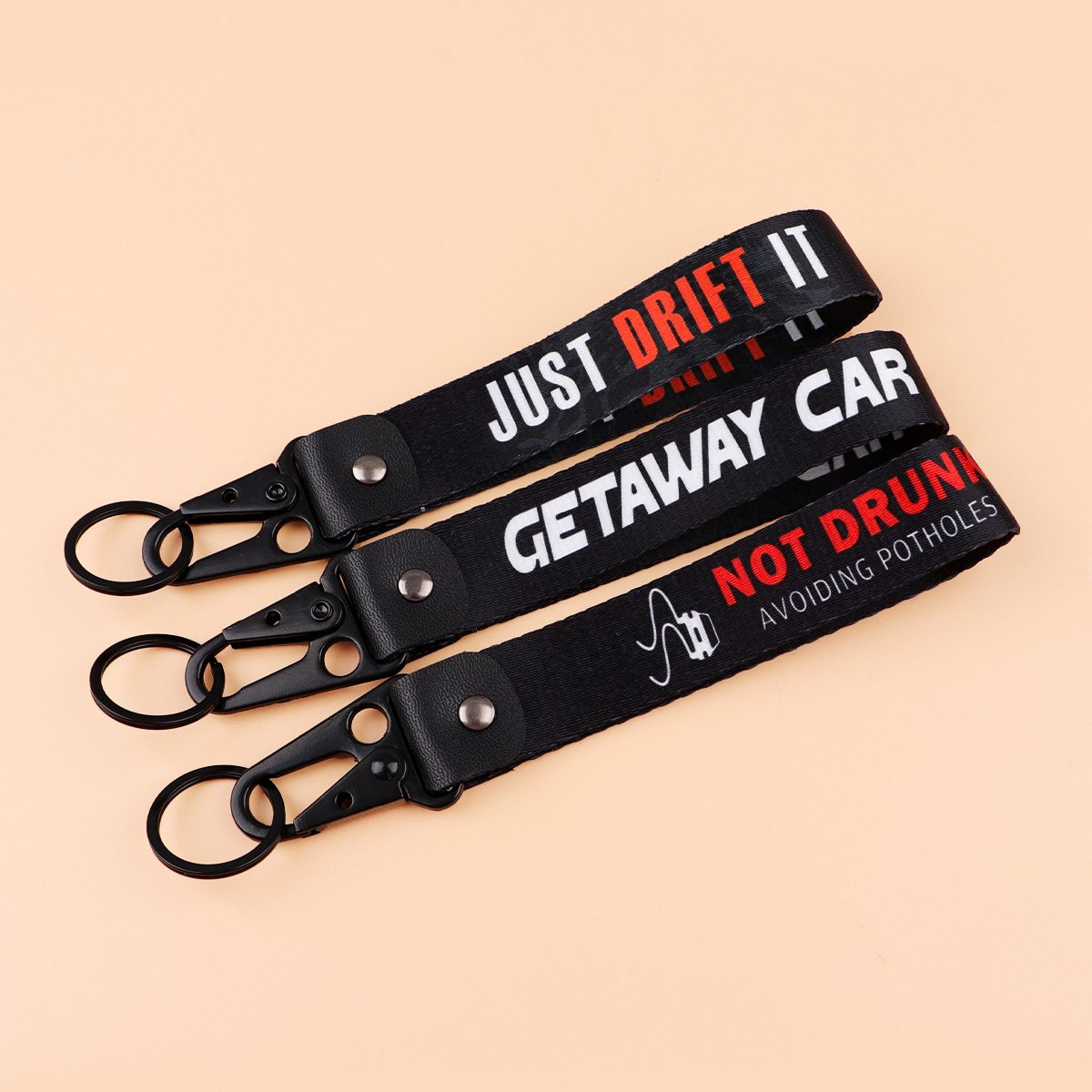 Gantungan Kunci Racing Quote J - Tech Wear Accessories ulasan dan harga